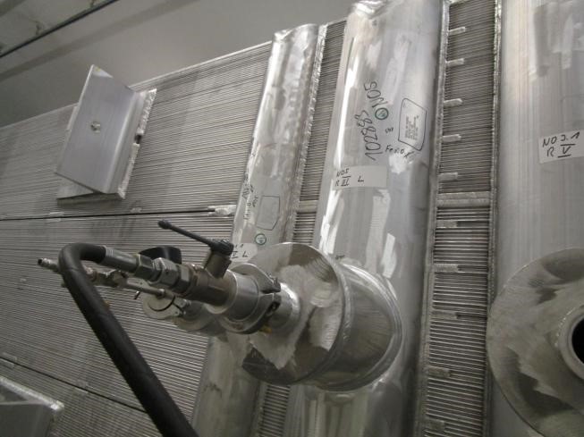 Heat exchanger under helium leak test